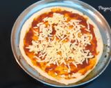 A picture of step 4 of Babycorn Pizza in Kadai.
