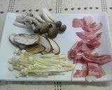 A picture of step 1 of Stir-Fried Pork and Mushroom with Butter and Soy Sauce.