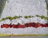 A picture of step 10 of Petit Strawberry Roll Cake with Ladyfinger Biscuit Crust.