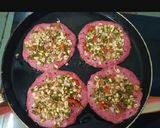 A picture of step 6 of Oats chila with sprouted beans topping.