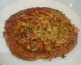A picture of step 19 of Home made pizza with vegetables n cheese toppings.