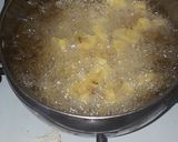 A picture of step 2 of French fries with chicken.