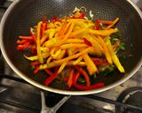 A picture of step 2 of Marinated Beef with Bell Peppers and Cherry Tomatoes.