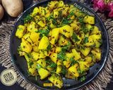 A picture of step 4 of Jeera Aloo (Cumin Potatoes).