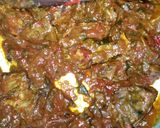 A picture of step 7 of Chips masala, wetfry beef with sausages.