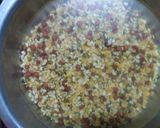 A picture of step 1 of Palak panch dal khichdi tempered with burnt garlic.