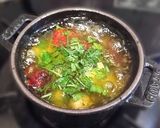 A picture of step 6 of Ajillo with Japanese Leek and Dried Tomatoes.