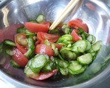 A picture of step 4 of Marinated Tomato and Cucumber.