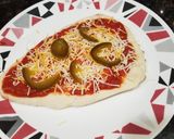 A picture of step 1 of Tandoori naan jalapeno cheese pizza.