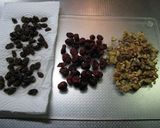 A picture of step 1 of Chewy Little Walnut-Raisin Whole Wheat Rolls.