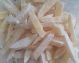 A picture of step 2 of Mayo garlic French Fries.