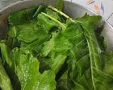 A picture of step 11 of Kashmiri kadam Saag Chicken.