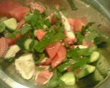 A picture of step 5 of Octopus and Cucumber Salad with Lemon Dressing.