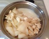A picture of step 11 of Kenchin Simmered Daikon Radish and Firm Tofu.