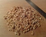 A picture of step 7 of 'Dulce de Leche' ricotta cheesecake with caramelized hazelnuts.