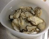 A picture of step 1 of Sublime Sake-Steamed Oysters.