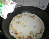A picture of step 5 of Sublime Pasta with Garlic, Bacon and Heavy Cream.