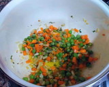 Foto del paso 8 de la receta: Arroz súper caldoso de almejas al azafrán en dos caldos