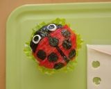 A picture of step 3 of Ladybug Onigiri Bento.