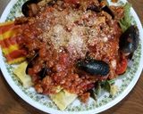 A picture of step 7 of Spinach Fettuccine with Lobster Ravioli, Mussels, & Meat Sauce.