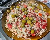 Une image de l'étape 10 de Salade de boulgour aux tomates, courgette, olives, persil et saucisses épicées.