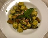 A picture of step 5 of Potato Gnocchi with Seafood, Pesto, and Toasted Pine Nuts.