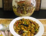 A picture of step 8 of Kung pao chicken with egg fried rice.