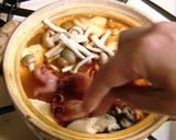 A picture of step 5 of Sundubu Jjigae (Korean Soft Tofu Stew).