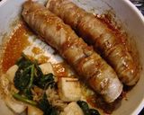 A picture of step 4 of Hanpen Wrapped in Sliced Pork Belly.