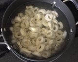 A picture of step 1 of Creamy Sausage Tomato Tortellini.