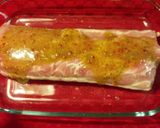 A picture of step 2 of Bacon wrapped garlic and herb pork loin.
