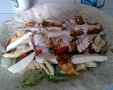 A picture of step 1 of Grilled chicken burrito.