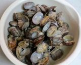 A picture of step 8 of Asari Clam Rice.