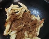 A picture of step 5 of Potato roast with walnut masala.