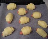 A picture of step 4 of Cheese Wiener Sausage Wraps.