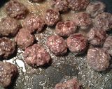 A picture of step 4 of curry mini patties in sauce.