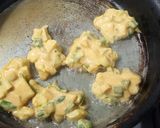 A picture of step 2 of Alu Hari pyaz k pakoray.