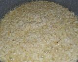 Foto del passaggio 4 della ricetta Risotto con crema di piselli, stracciatella Campana e pancetta