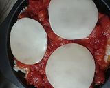 A picture of step 5 of Cheesy, tomato ,and rice with a little meat pie.