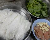 A picture of step 1 of Pad See Ew / Stir Fried Wide Rice Noodles with Chicken.