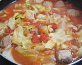 A picture of step 8 of Meltingly Soft Cabbage and Meatballs Stewed in Tomatoes.