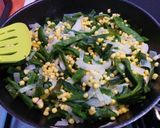 A picture of step 3 of Corn and rajas (pepper strips).