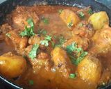 A picture of step 2 of Paanch Phoron Chicken.