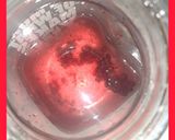 A picture of step 1 of BlackBerry strawberry detox water.