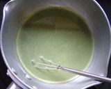 A picture of step 26 of Green Tea and White Chocolate Mousse Cake.