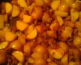 A picture of step 4 of Sausage and taters.
