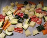 A picture of step 3 of Garlic roasted veg with oven baked salmon.