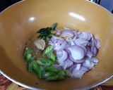 A picture of step 2 of Bitter Gourd Fry.