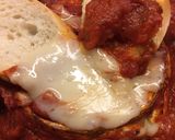 A picture of step 7 of Baked Goat Brie in Spicy Garlic Tomato Sauce.