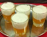 A picture of step 5 of Orange Jelly Pudding Layer in a Glass.
